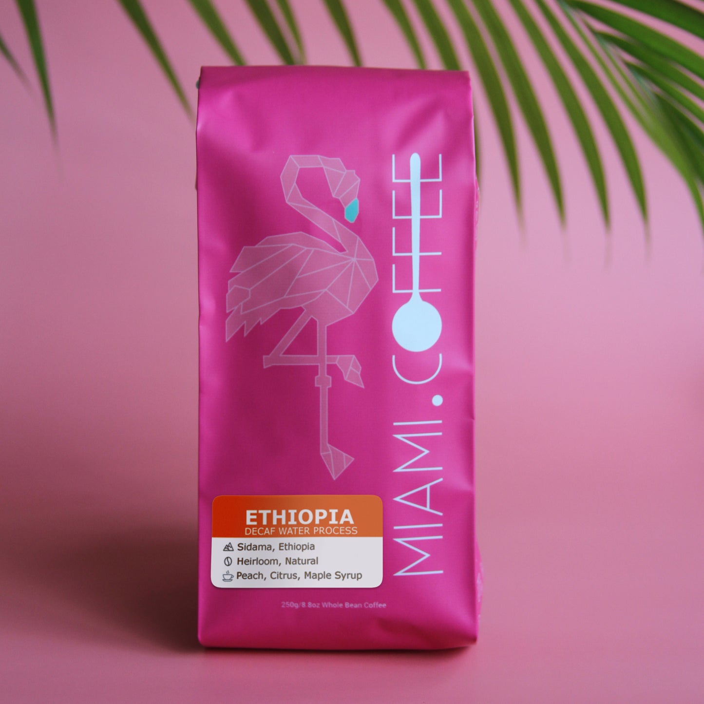 9 ounce bag of Ethiopia Water Process Decaf by Miami (dot) Coffee Flavor Descriptors Peach, Citrus, Maple Syrup.