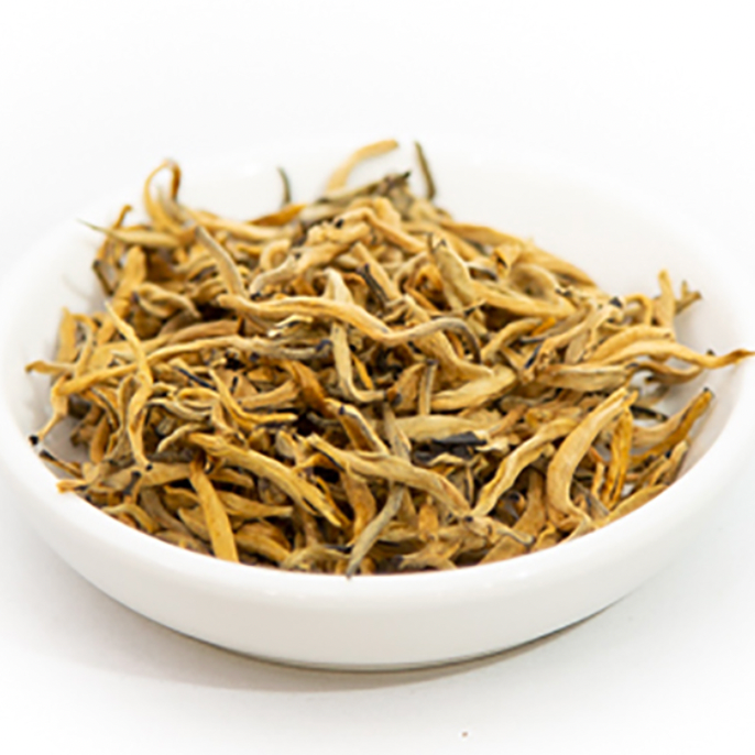 Gold colored black tea buds from Miami.Coffee