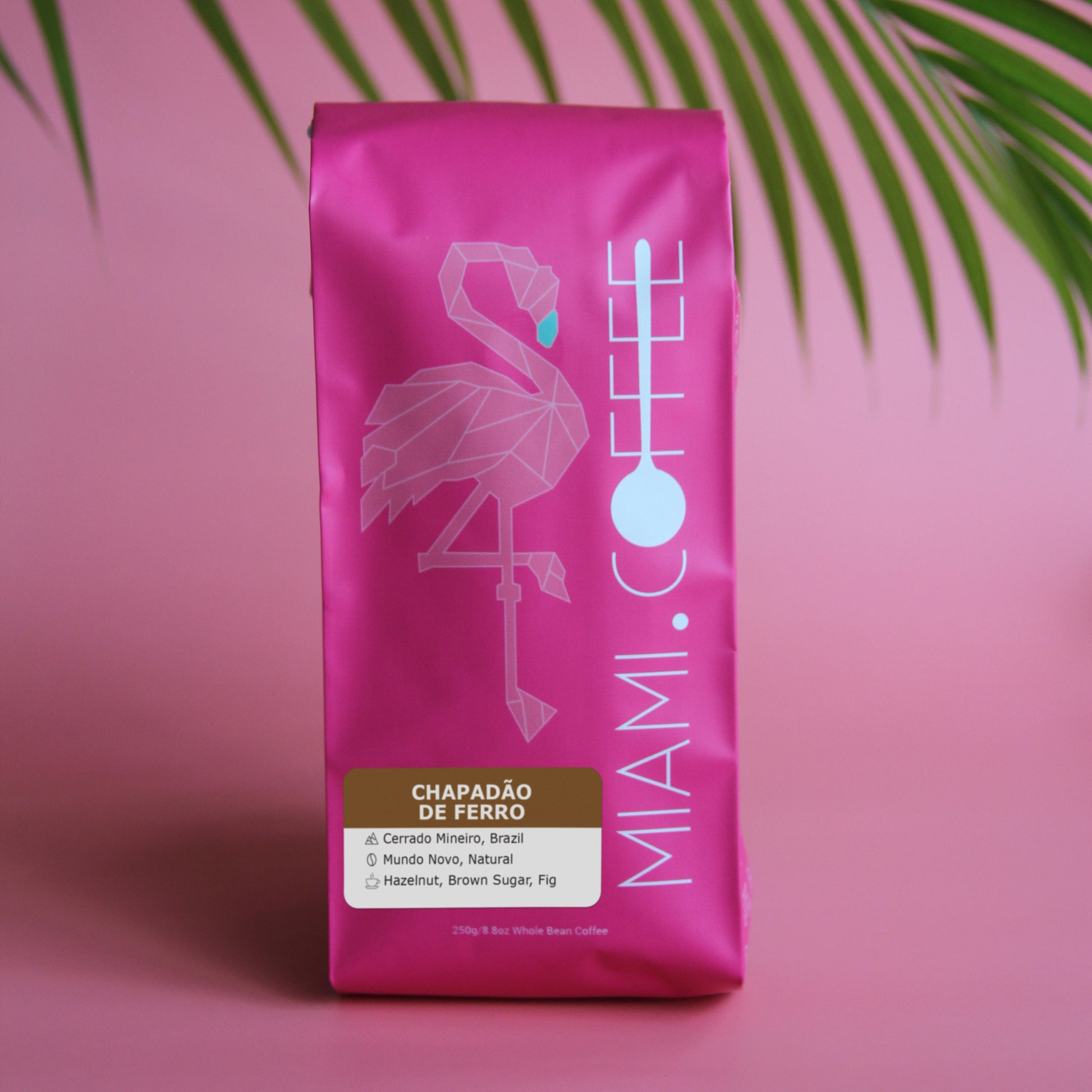 250 gram bag of Miami dot Coffee - Chapadão de Ferro, from Cerrado Mineiro Brazil. Mundo Novo Cultivar, Natural Process. Tasting Notes - Hazelnut, Brown Sugar, Fig