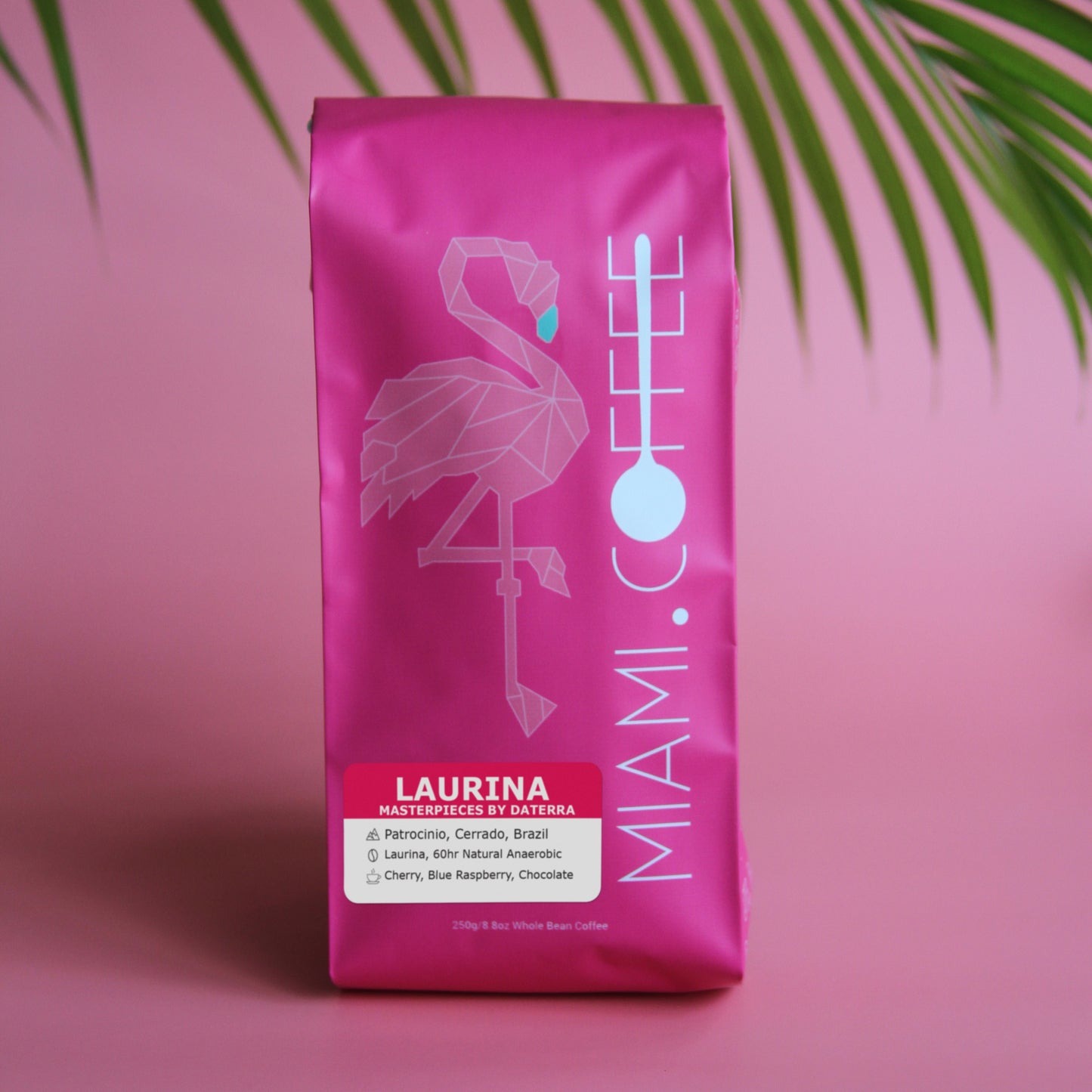 250 gram bag of Miami dot Coffee, Laurina - Masterpieces by Daterra Sustainable and Climate Friendly Coffee Farm in Patrocinio, Cerrado, Brazil. Laurina cultivar processed by a 60 hour Natural Anaerobic Fermentation. Tasting notes of cherry, Blue raspberry, and chocolate